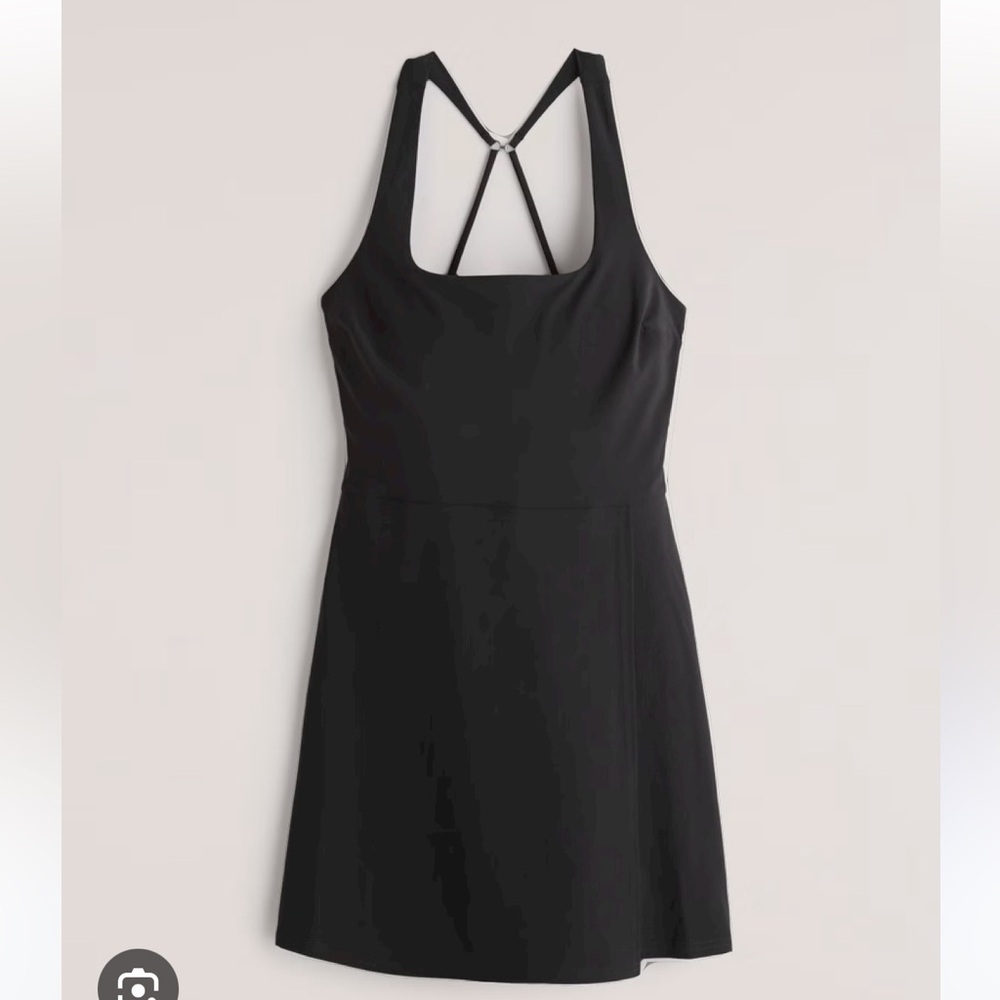 Women’s traveler wrap mini dress in black